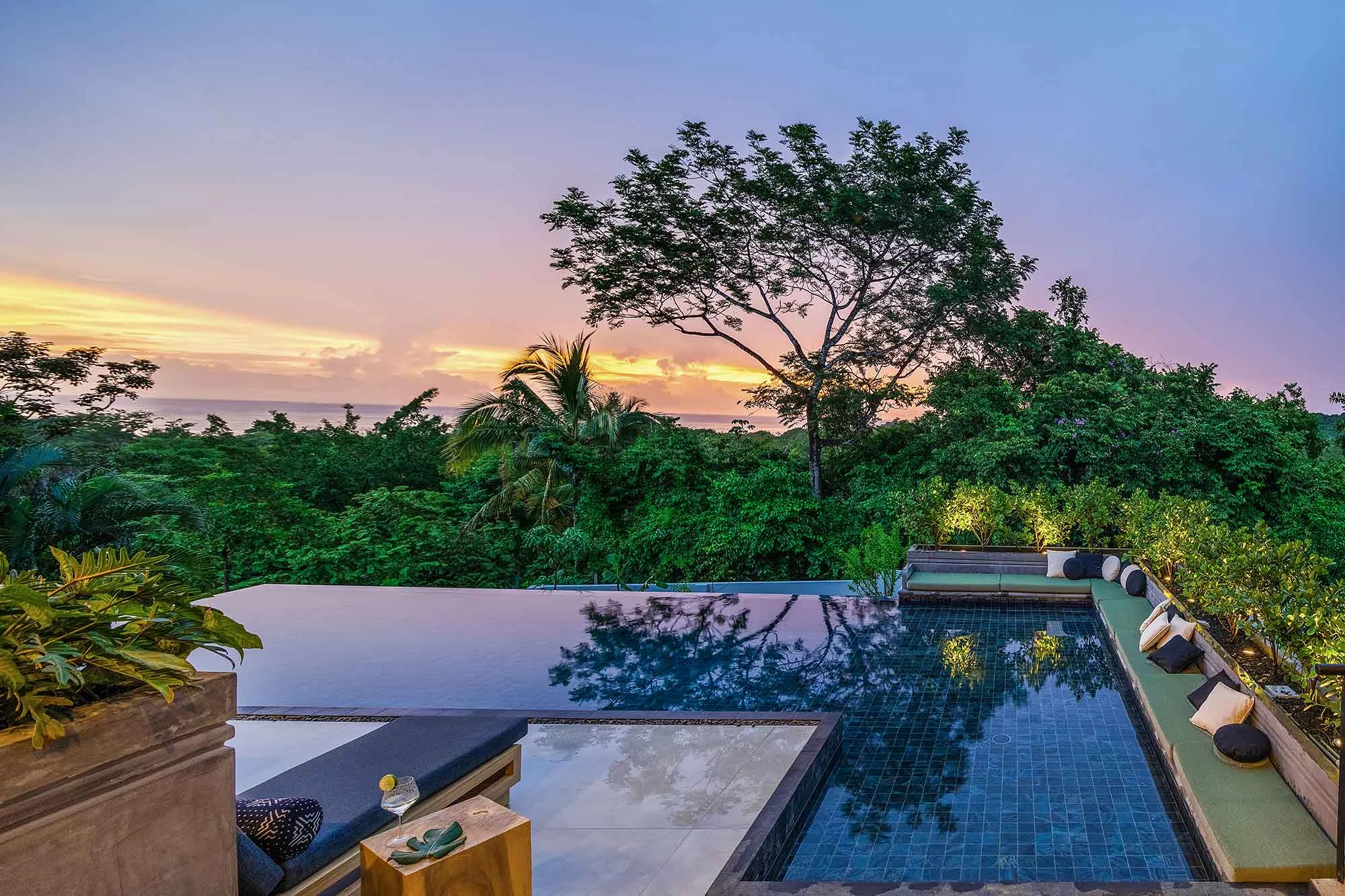 Raintree Casa second-story infinity pool at sunset, Nosara, Costa Rica
