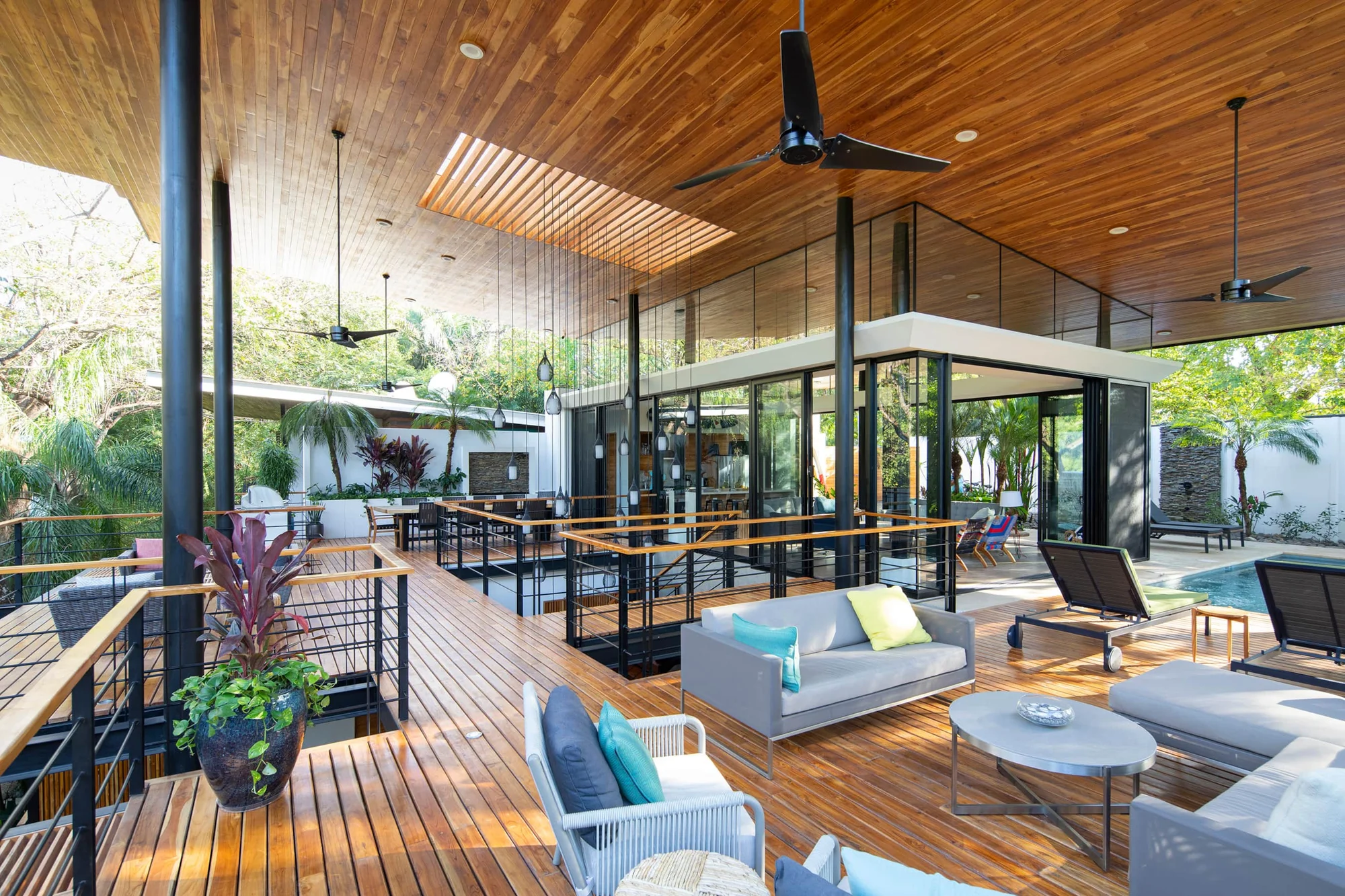 Terrace House villa open deck and living area with view to jungle canopy, Playa Guiones Nosara, Costa Rica