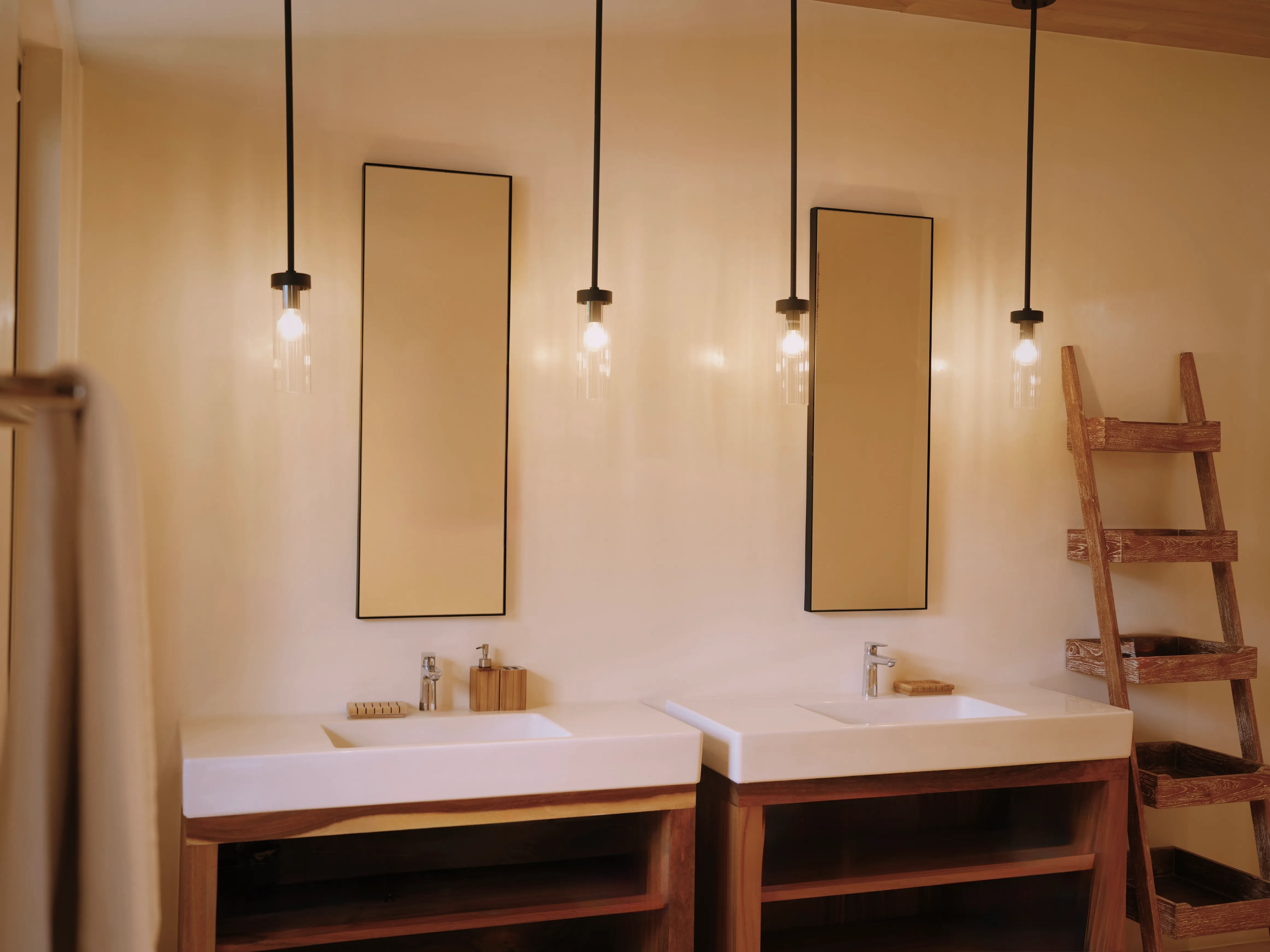 Tres Hermanas villa shared bathroom with dual vanity and pendant lighting, Nosara