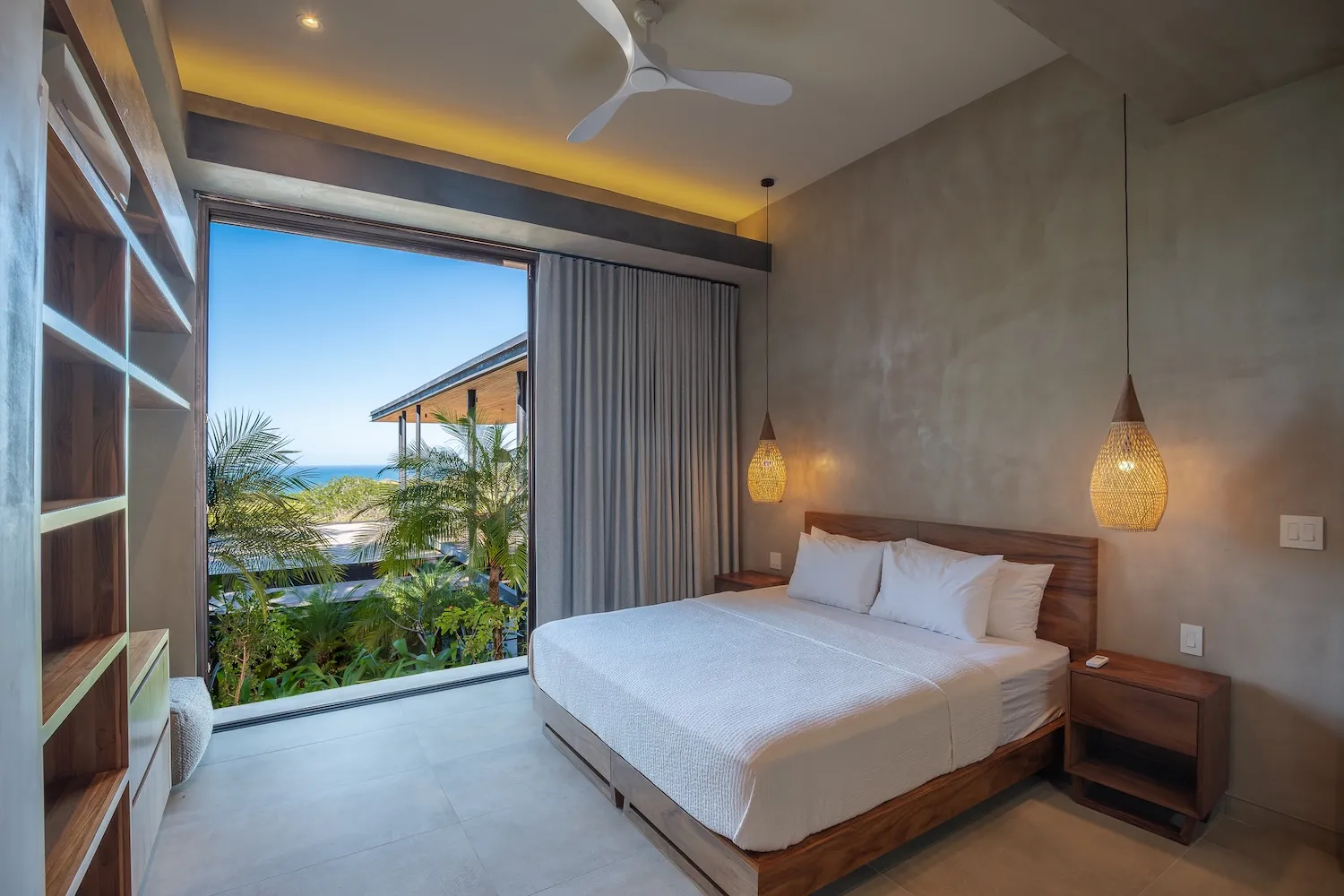 Stella Maris villa bedroom with pendant lighting and jungle view, Nosara