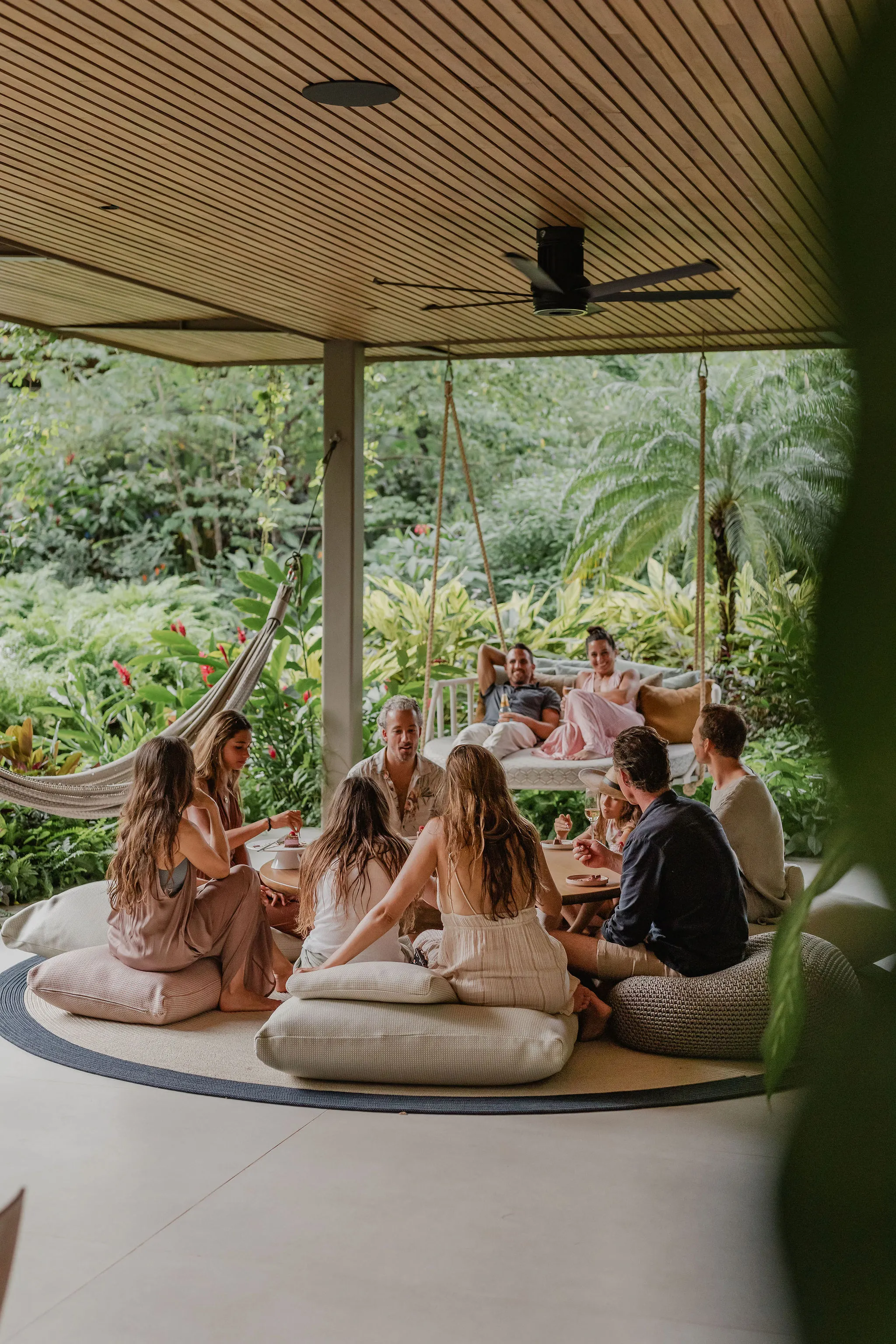 SEN villa open-air yoga shala with practitioners in session, surrounded by jungle, Nosara, Costa Rica