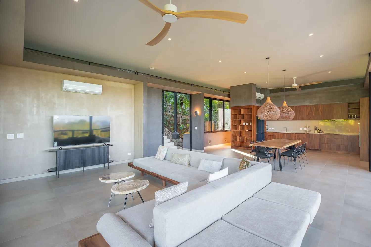 Stella Maris villa open-plan living with floor-to-ceiling glass, Nosara