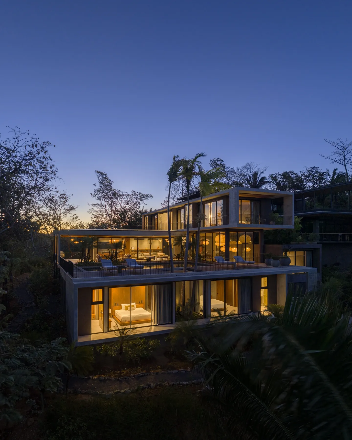 Villa Aravis twilight exterior of guest rooms, Las Huacas Nosara