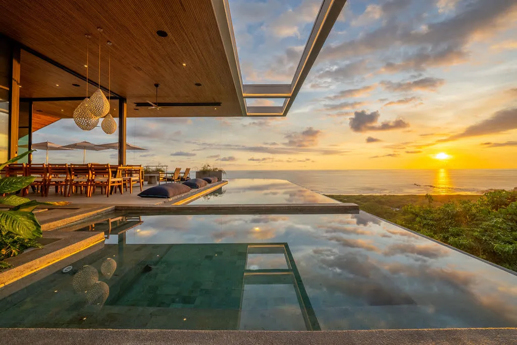 Villa Zenith infinity pool at sunset for a couples retreat in Nosara