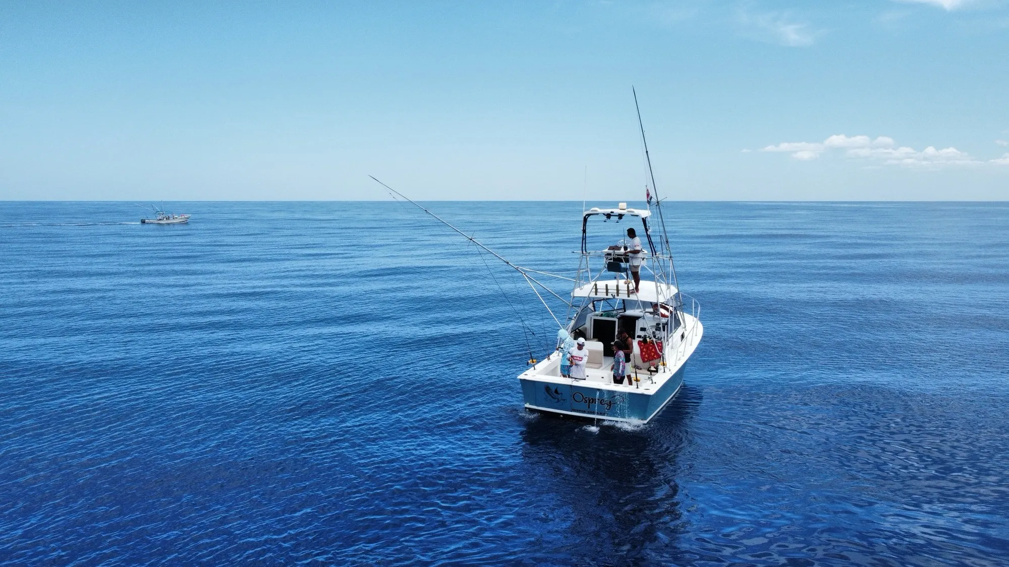 The Osprey, our 32ft sportfishing boat, trolling offshore on the Pacific near Nosara, Costa Rica